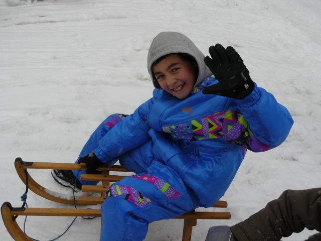 Winterspaß beim Schlittenfahren